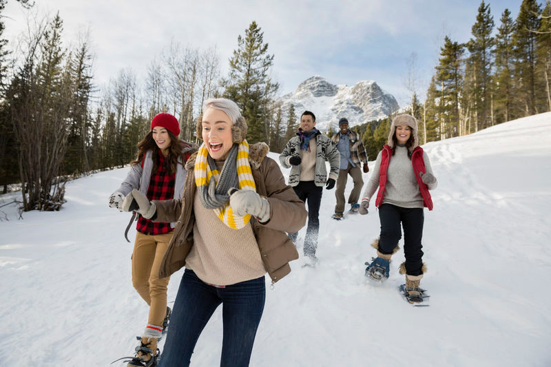 A group of people snowshoeing in Kananaskis